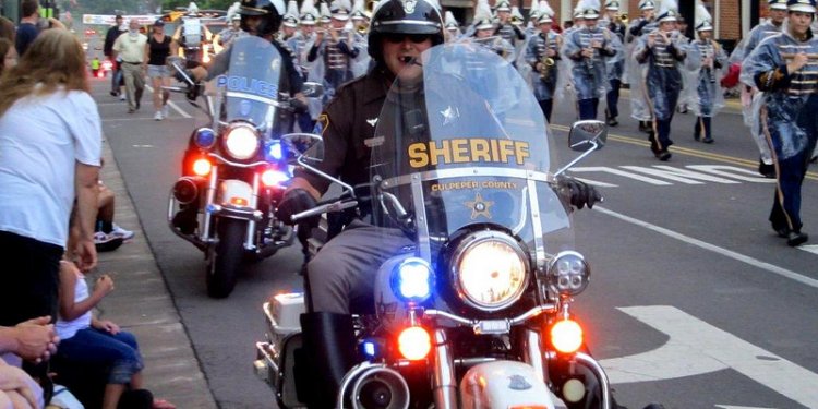 Motor Dep. Chad McKnight of the Special Operations division helps patrol Main Street on May 24, 2012...