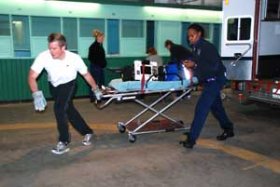 An applicant finishes one station for the division's physical ability test.