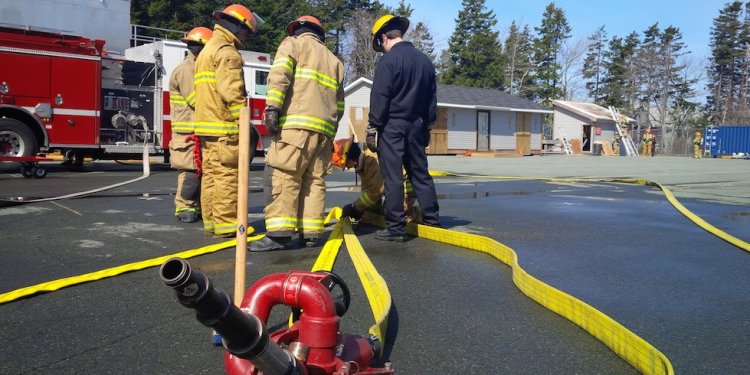 How do Volunteer firefighters get paid?