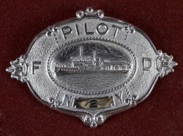 Pilot’s limit product (cap badge).