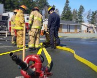 How do Volunteer firefighters get paid?