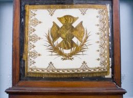 Two orotone glass-plate photographs of very first banner of FDNY mounted in custom display instance, presented to your department in 1887.